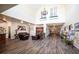 Spacious lobby with high ceilings, elegant decor, and comfortable seating at 3257 Bailey Ann Dr, Ormond Beach, FL 32174