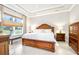 The main bedroom offers ample natural light and showcases traditional furnishings creating a serene retreat at 3257 Bailey Ann Dr, Ormond Beach, FL 32174