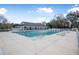 Large outdoor swimming pool with lounge chairs and well-maintained surroundings at 3257 Bailey Ann Dr, Ormond Beach, FL 32174