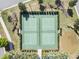 Overhead view of tennis and pickleball courts featuring lush green surroundings at 3257 Bailey Ann Dr, Ormond Beach, FL 32174