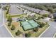 Aerial view of tennis courts and a nearby community at 3257 Bailey Ann Dr, Ormond Beach, FL 32174