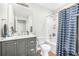 A well-maintained bathroom featuring a vanity with ample storage and a shower-tub combination at 348 Southern Winds Blvd, Deland, FL 32720