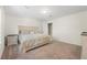 Comfortable bedroom with neutral tones, plush carpeting, and ample natural light at 348 Southern Winds Blvd, Deland, FL 32720