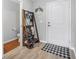 Welcoming entryway features a practical coat rack, creating an organized and inviting space at 348 Southern Winds Blvd, Deland, FL 32720