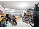 Spacious garage providing ample room for parking and storage, equipped with a roll-up door at 348 Southern Winds Blvd, Deland, FL 32720