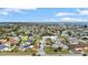 Wide aerial shot of a neighborhood showcasing the home's proximity to the ocean and community features at 4 Water Oak Cir, Ormond Beach, FL 32176