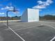 Basketball court with freshly painted lines, ready for a competitive game of hoops at 4 Water Oak Cir, Ormond Beach, FL 32176