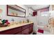 Bathroom featuring a large countertop, cabinets underneath, and a mirror above the sink at 4 Water Oak Cir, Ormond Beach, FL 32176