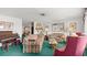 Bright living room featuring comfortable seating and a piano perfect for Gathering time and gatherings at 4 Water Oak Cir, Ormond Beach, FL 32176