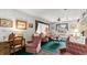 Comfortable living room features a desk and pink accent chairs at 4 Water Oak Cir, Ormond Beach, FL 32176
