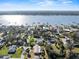 Expansive aerial view of a coastal neighborhood with waterfront homes and docks at 445 John Anderson Dr, Ormond Beach, FL 32176
