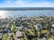 Wide aerial view of a coastal neighborhood featuring waterfront estates and luxury homes at 445 John Anderson Dr, Ormond Beach, FL 32176