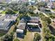 Large backyard with a pool enclosure and plenty of space for parking at 445 John Anderson Dr, Ormond Beach, FL 32176