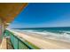 Second-story balcony view overlooking the white sand beach and Atlantic ocean at 4555 S Atlantic Ave # 4508, Port Orange, FL 32127
