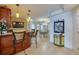 Wet bar with built in cabinets and tile flooring at 4555 S Atlantic Ave # 4508, Port Orange, FL 32127