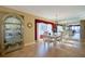 Bright dining room with elegant furniture, chandelier, and large windows for ample natural light at 4555 S Atlantic Ave # 4508, Port Orange, FL 32127