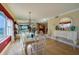 Open dining area featuring a chandelier, and views of the gulf at 4555 S Atlantic Ave # 4508, Port Orange, FL 32127