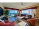 Bright living room showcasing stunning ocean views through large windows and sliding glass doors at 4555 S Atlantic Ave # 4508, Port Orange, FL 32127