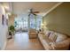Open living room with easy access to the bar, dining room, and sun room at 4555 S Atlantic Ave # 4508, Port Orange, FL 32127