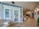 Bright living room with floor to ceiling windows and tile flooring at 4555 S Atlantic Ave # 4508, Port Orange, FL 32127