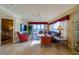 Cozy living room with ocean views, comfortable seating and lots of natural light at 4555 S Atlantic Ave # 4508, Port Orange, FL 32127