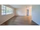 Spacious living room featuring natural light and modern flooring throughout the home at 919 Northbrook Dr, Ormond Beach, FL 32174