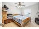 Cozy bedroom featuring a ceiling fan and a window at 934 Wilmington Dr, Deltona, FL 32725