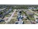 Aerial view of a quiet neighborhood with well-maintained homes and tree-lined streets at 934 Wilmington Dr, Deltona, FL 32725