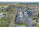 Overhead view of townhouse community with parking, trees, and neighborhood amenities at 1101 Deer Springs Rd, Port Orange, FL 32129