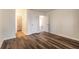 Spacious bedroom showcasing modern wood floors and ample closet space at 1101 Deer Springs Rd, Port Orange, FL 32129