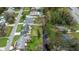 Aerial image of the home's position within the neighborhood, close to a waterway and well-kept properties at 13 Twin River Dr, Ormond Beach, FL 32174