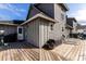 Large wooden back deck with outdoor seating, perfect for al fresco dining and relaxing at 13 Twin River Dr, Ormond Beach, FL 32174