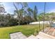 Large backyard overlooking the conservation area, with room for gardening and outdoor activities at 13 Twin River Dr, Ormond Beach, FL 32174