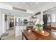 Charming kitchen and breakfast area featuring stainless steel appliances, bright cabinets, and an adjacent laundry room at 13 Twin River Dr, Ormond Beach, FL 32174