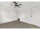 Bedroom featuring a ceiling fan, neutral walls, and stylish wood-look floors at 134 Knight Pl, Daytona Beach, FL 32114