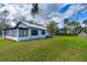 Wide view of the property highlighting the expansive lawn and appealing exterior design at 134 Knight Pl, Daytona Beach, FL 32114