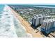 Aerial view of the oceanfront condos, with a walkover to the beach and pool at 1415 Ocean Shore Blvd # L1, Ormond Beach, FL 32176