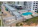 Aerial view of the kidney shaped pool and lounge area of this stunning property at 1415 Ocean Shore Blvd # L1, Ormond Beach, FL 32176