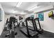 Modern gym featuring treadmills, elliptical machines, and stationary bikes for a complete cardio workout at 3333 S Atlantic Ave # 1802, Daytona Beach, FL 32118