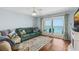 Cozy living room with water views and balcony access at 3333 S Atlantic Ave # 1802, Daytona Beach, FL 32118