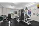 Well-equipped workout room with modern exercise equipment and a mirrored wall to enhance your fitness routine at 3333 S Atlantic Ave # 1802, Daytona Beach, FL 32118