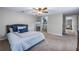 Comfortable bedroom featuring soft lighting and a ceiling fan for a cozy ambiance at 354 Fir St, Ormond Beach, FL 32174