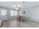 Dining room with stylish decor, a ceiling fan, and easy access to the kitchen at 354 Fir St, Ormond Beach, FL 32174