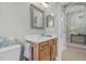 Bathroom features a vanity with a sink, mirror and an adjacent toilet at 1143 Champions Dr, Daytona Beach, FL 32124