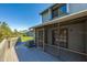 Enjoy the outdoors in this screened back porch and deck with views of the community pond at 150 Limewood Pl # F, Ormond Beach, FL 32174