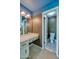 Bright bathroom features a vanity and adjacent toilet room with neutral colors and fixtures at 150 Limewood Pl # F, Ormond Beach, FL 32174