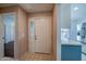 Bright foyer featuring neutral walls, closet, and entryway to the kitchen at 150 Limewood Pl # F, Ormond Beach, FL 32174