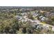 A scenic aerial view captures the well-maintained neighborhood and its lush green surroundings at 25 Misners Trl, Ormond Beach, FL 32174