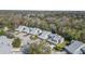 Aerial view showing mature landscaping and the surrounding community at 25 Misners Trl, Ormond Beach, FL 32174