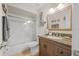 Bathroom with a shower over tub and granite vanity at 25 Misners Trl, Ormond Beach, FL 32174